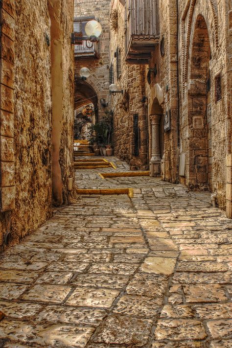 An old Jaffa street in Tel Aviv, Israel • photo: Vlad F on Flickr UNA HISTÓRICA Y RECORDADA CALLE. Vila Medieval, Stone Buildings, Rhodes Greece, Medieval Village, Bhutan, Libya, Old City, Greece Travel, Greek Islands