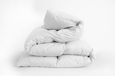 Folded soft white duvet, blanket or beds... | Premium Photo #Freepik #photo #background #house #clothes #feather