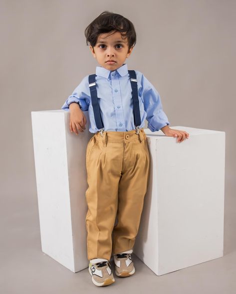 𝐋𝐢𝐭𝐭𝐥𝐞 𝐆𝐞𝐧𝐭𝐥𝐞𝐦𝐚𝐧 𝐀𝐥𝐞𝐫𝐭! ✨ Arham is rocking our beige pants, navy blue suspenders, and a crisp blue shirt. Perfect for birthdays, weddings, or any day you want your little one to steal the spotlight! 💙👔 Boys Formal Outfits | Kids Suspenders | Stylish Boys Wear | Beige and Blue Combo Boys Formal Outfits, Formal Boys Outfit, Kids Suspenders, Navy Blue Suspenders, Outfit Ideaa, Boys Formal, Blue Suspenders, Suspenders For Kids, Beige And Blue