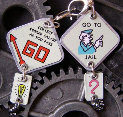 monopoly jewelry - Google Search Unique Upcycled Jewelry Gift, Board Game Upcycle, Monopoly Jewelry, Monopoly Crafts, Upcycled Jewelry Artful Home, Monopoly Charm Bracelet, Upcycle Jewelry Box, Diy Jewelry Holder, Found Object Jewelry