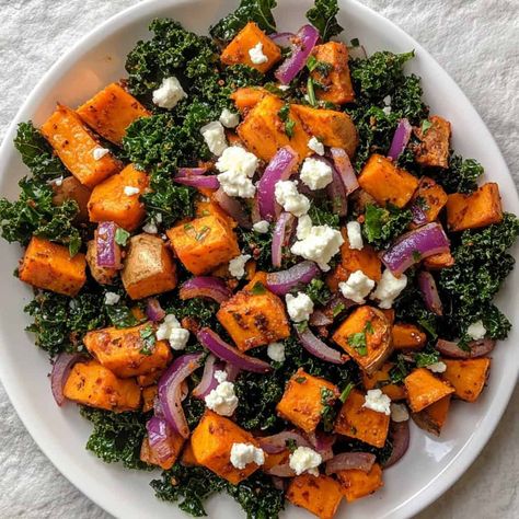 Sweet Potato and Kale Hash A vibrant hash with roasted sweet potatoes, sautéed kale, and red onions, topped with crumbled feta cheese on a white plate. Sweet Potato Kale Hash, Hash Recipes, Turkey Hash, Sweet Potato And Kale, Breakfast Hash Recipes, Greek Breakfast, Sautéed Kale, Steak Breakfast, Sweet Potato Kale