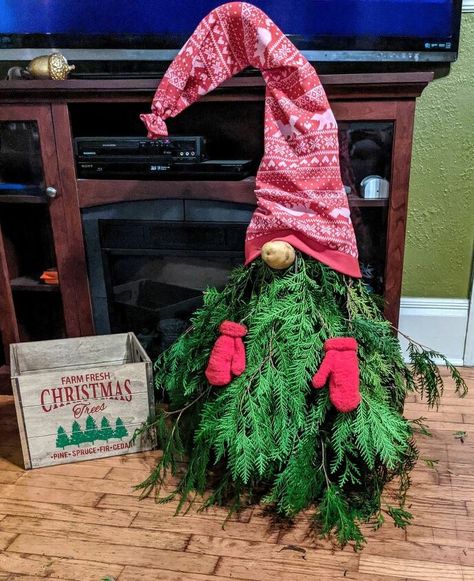 I love Gnomes and this was so easy to do! All you need for each gnome is a tomato cage, branches from a Christmas tree, a pair of toddler mittens, a pair of small leggings or sweater for the hat, a potato for the nose, a coat hanger to make the end of the hat droopy, some wire to attach the nose and mittens, about 12 zip ties to attach the branches, a piece of string or ribbon to tie the end of the hat shut and metal stakes or bricks so it won't topple in the wind. Tomato Cage Gnome, Diy Tomato Cage, Tomato Cage Crafts, Tomato Cage Christmas, Tomato Cage Christmas Tree, Toddler Mittens, Plaid Christmas Tree Skirt, Red Mittens, Buffalo Plaid Christmas Tree