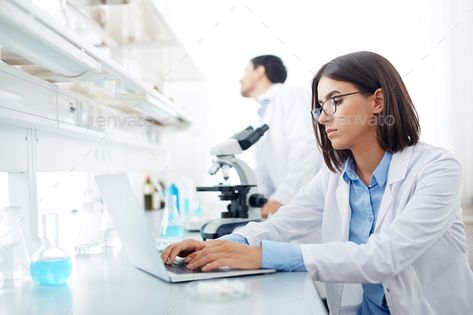 Female scientist by Pressmaster. Female scientist typing in lab in working environment#Pressmaster, #scientist, #Female, #typing Microscope Activity, Biomedical Science, Women Scientists, Lose 5 Pounds, Cool Science Experiments, Preventative Health, Medical Laboratory, Diet Exercise, Eye Doctor