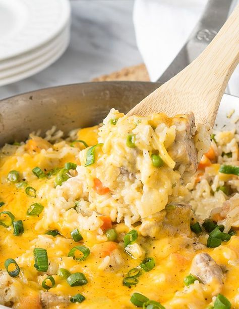 Are you ready for another ONE SKILLET dinner? I'm coming at you with this Cheesy Pork and Rice Skillet! It's so creamy, cheese and filled with plump pork, tender rice and loads of veggies! A complete meal, all made in one skillet! Is it just us or does the end of the school year only mean life gets a little crazier? My kindergartener 'graduated' last week... yet I'm still having to take her to school for another week and a half. This week my preschooler 'graduates'... Pork Sirloin Chops, Pork And Rice, Pork Casserole, Pork Sirloin, Rice Skillet, Leftover Pork, Mexican Beef, Skillet Dinners, One Skillet