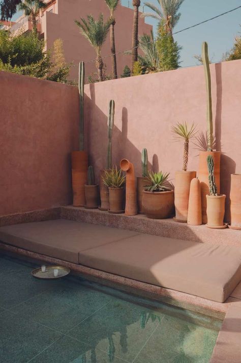 moroccan boutique hotel merges traditional architecture with contemporary touches Wooden Bed Base, Courtyard Cafe, Moroccan Houses, Terrazzo Floors, Modern Desert, Contemporary Building, Marrakesh Morocco, Desert House, Modern Moroccan