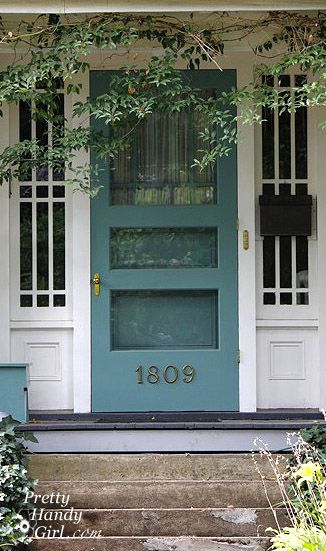 Teal blue door + screen. Also like the house numbers placement on the screen. Since there are steps up to the house, its actually a comfy place for your eyes to see the numbers. Unique Front Doors, Cabin Porch, Blue Front Door, Door Paint Colors, Screen Doors, Painted Front Doors, Front Door Colors, House Doors, House Decorating