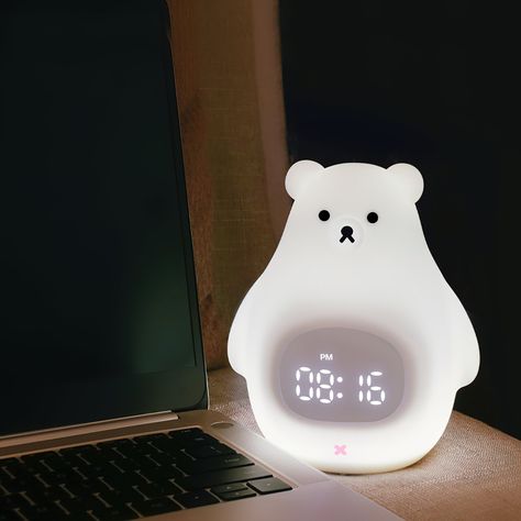 The Great White Bear Alarm Clock Night Light is both an alarm clock and night light in one! It's perfect for children's rooms, providing a comforting and playful design while also helping them learn to tell time. The clock also features a gentle alarm to help wake them up for the day ahead. What does it mean to set of 2?It simply means that there are two lights, each with the separate quantity indicated, in the order & packaged together. Please Note: The dimensions of this lamp are very small, o Cute Alarm Clock Amazon, Cute Digital Clock, Cute Alarm Clocks, Digital Alarm Clock Aesthetic, Cute Clocks, Alarm Clocks, Aesthetic Clock, Cute Lamp, Cute Alarm Clock