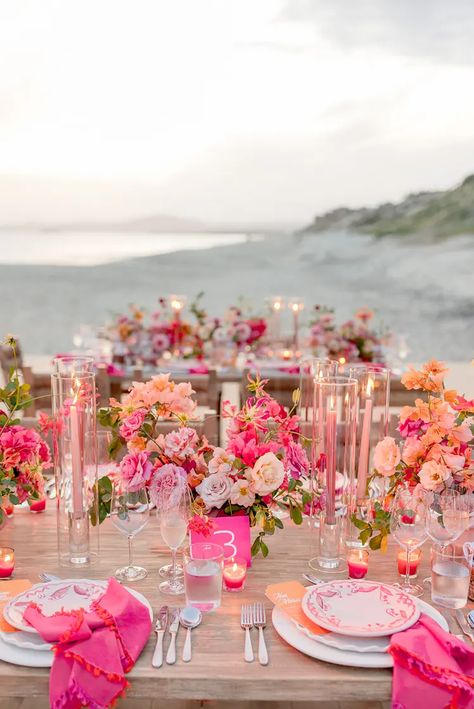 This colorful Cabo wedding is giving us boho Barbie vibes! Colorful Cabo Wedding, Mix And Match Tablescape, Spring Wedding Dinner Ideas, Bright Pink Centerpieces, Spring Wedding Colors Pink, Pink And Orange Party Ideas, Different Shades Of Pink Wedding, Wedding Aesthetic Pink, Spring Wedding Ceremony Decor