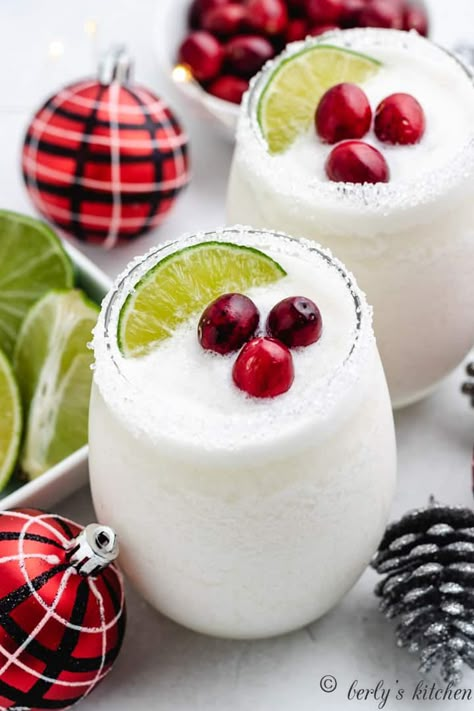 White Christmas Margarita Christmas Margaritas, White Christmas Margarita, Funny White Elephant Gifts, Holiday Margaritas, Christmas Margarita, Christmas Party Drinks, Coconut Margarita, Pineapple Margarita, Seasonal Cocktail