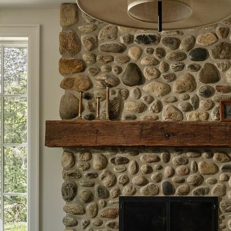 Tiffany Leigh Design on Instagram: "In a renovation, it can be tempting to rip everything out and start fresh, but we love to look for ways to restore existing features to their fullest potential. At Alton House, the wood-burning fireplace, constructed from local river rock, was beloved by both our clients and team TLD, except for a drywall bulkhead that cut it off at the top, making it look squat and dated. By rerouting the HVAC, we eliminated the bulkhead and matched the riverstone to take t Flagstone Fireplace, River Rock Fireplace, Tiffany Leigh Design, River Rock Fireplaces, New House Living Room, Rock Fireplaces, Chimney Breast, Fireplace Design, River Rock