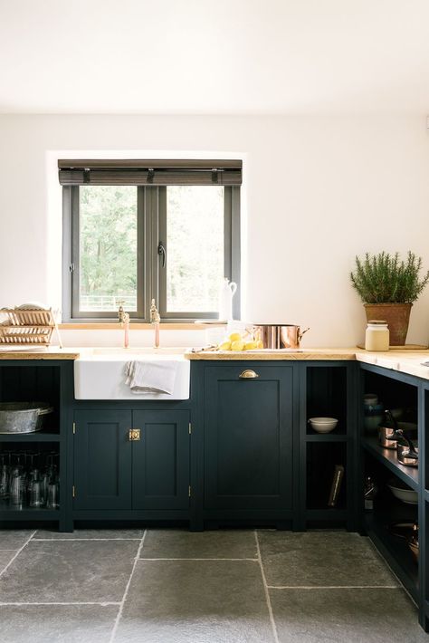 A farmhouse sinks, brass taps and dark blue Shaker cupboards in deVOL's Leicestershire Kitchen in the woods Furniture Blue, Shaker Style Kitchens, Farmhouse Kitchen Design, Diy Kitchen Cabinets, Kitchen Cabinet Colors, Grey Kitchens, Tile Flooring, Black Cabinets, Furniture Stores