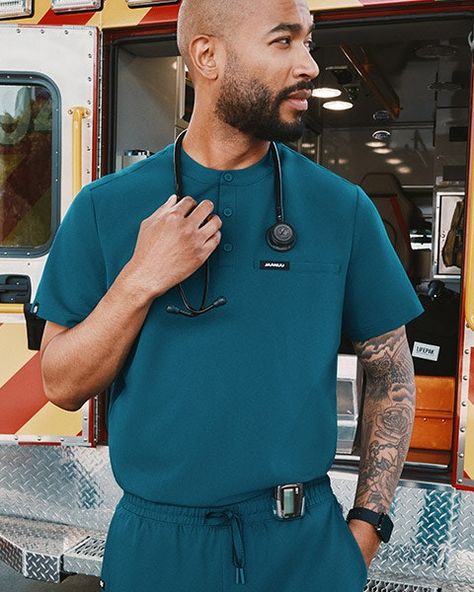 Performance Scrubs, Medical Apparel and Face Masks | Jaanuu Scrubs Aesthetic Men, Medical Scrubs Men, Stylish Scrubs, Scrubs Medical, Male Nurse, Scrubs Uniform, Mens Scrubs, Medical Outfit, Blue Scrubs