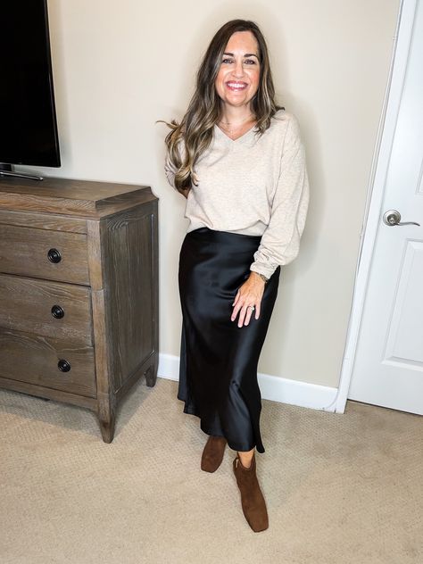 This is a great holiday outfit. It’s so cute and comfortable. It would be great for entertaining at home or going out. . . Black slip skirt, boots, lightweight sweater, holiday outfit, casual chic, elevated casual, over 40 fashion, Follow my shop @Southbaydreamin on the @shop.LTK app to shop this post and get my exclusive app-only content! #liketkit #LTKSeasonal #LTKtravel #LTKHoliday #LTKstyletip #LTKbeauty #LTKshoecrush #LTKunder100 #LTKunder50 #LTKCyberweek @shop.ltk https://liketk.it/3Vs Slip Skirt And Sweater Outfit, Black Slip Skirt, Outfit Casual Chic, Over 40 Fashion, Entertaining At Home, Skirt Boots, Elevated Casual, 40 Fashion, Transition Outfits