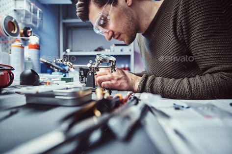 Electronic technician repair damaged smartphone in the workshop by fxquadro. Electronic technician working in the modern repair shop #Sponsored #damaged, #smartphone, #repair, #Electronic Electronic Technician, Macbook Repair, Iphone Screen Repair, Ipad Repair, Smartphone Repair, Water Damage Repair, Appliance Repair Service, Publicidad Creativa, Cell Phone Repair