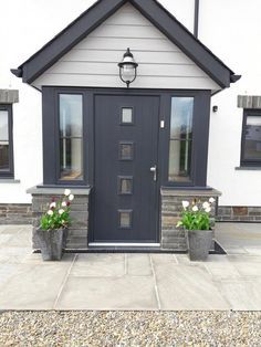 Anthracite Grey Front Door Porch, Light Grey Cladding, Porch Cladding Ideas, External House Cladding, Light Grey Cladding Exterior, Cladded Porch Entrance, Grey Porch Ideas, Front Porch Cladding, Cladding House Exterior Uk