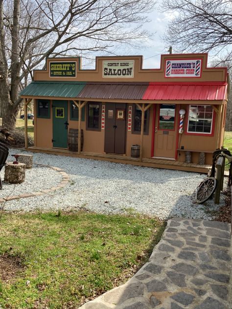 Western Town Jail/Saloon/Barber Shop Old West Town Privacy Fence, Western Facade Design, Old Western Town Store Fronts, Western Barber Shop, Western Town Buildings, Saloon Interiors Ideas, Western Backyard, Western Facade, Shed Exterior Ideas