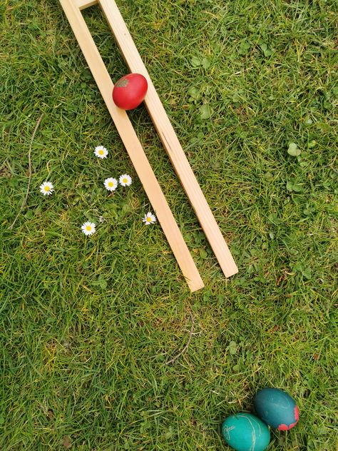 Rolling Easter Eggs is a traditional Slovenian Easter game that you can play at home. All you need are Easter Eggs and two wooden rakes. It is easy, fun and has no age limit. Try it out! Easter Egg Roll Game, Fun Easter Games, Egg Game, Chocolate Festival, Easter Games, Chocolate Eggs, Good Spirits, Easter Traditions, Easter Dinner