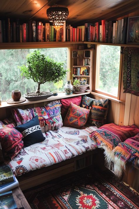 Tiny house library. Bonsai on a floating shelf with Moroccan cushions.

Welcome to a world where art, creativity, and minimalist living collide. If the word 'boho' makes your heart flutter and the thought of tiny libraries sends your mind spiraling into a world of imaginative exploration, prepare for a captivating journey. Step into an enchanted universe of 53 innovative and awe-inspiring…

Read more: https://tastyinteriors.com/generated-post-53-boho-tiny-house-library-ideas/ Tiny House Boho Decor, Tiny House Reading Nook, Boho Tiny House Interiors, House Library Ideas, Tiny House Library, Pirate Treehouse, Boho Tiny House, Whimsical Library, Tent Bedroom