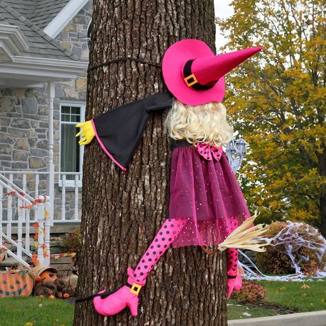 PRICES MAY VARY. Eye-Catching Halloween Tree ideas Decorations: Super cute playful pink witch have a pointed pink witch hat, wavy gold hair, She wears black robes are embellished with sparkly pink gauzy with pink bow tie and wears pink high shoes, The witch's legs and hands are filled with cotton to make it look more realistic. Straw-like brooms and open arms and legs show that she has crushed into tree, which makes the whole scene look unique and comically. The funny witch crashed Inject some l Fun Halloween Outdoor Decorations, Cool Halloween Decorations Front Yards, Pink Fall Porch Decor, Halloween Witches Decorations Outdoor, Halloween Tree Decorations Outdoor, Outdoor Witch Decor, Girly Halloween Decorations, Witch Door Decoration, Exterior Halloween Decorations