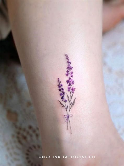 Simple lavender tattoo design ideas on arm, ankle, ribs and and more. If you want to creat lavender tattoo, you can browse our website from time to time. #tattooideas #flowertattoos #lavendertattoo Lavender Tattoo Minimalist, Dainty Lavender Tattoo, Small Tattoos Lavender, Simplistic Lavender Tattoo, Fine Line Flower Tattoo Lavender, Purple Flower Tattoos, Lilac Tattoo, Heather Flower, Tattoo For Boyfriend