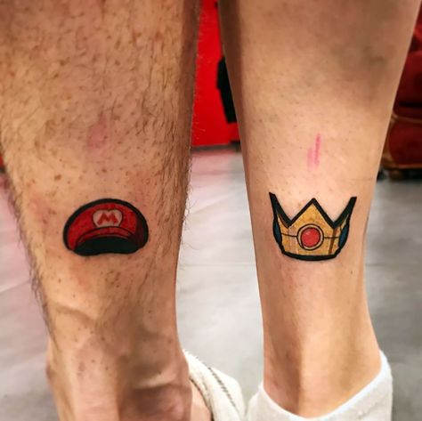 Couples Mario Tattoos, Anime Couple Tattoos Ideas, Mario Peach Tattoo, Minimalist Mario Tattoo, Mario And Peach Tattoo, Matching Tattoos Gaming, Mario Couple Tattoos, Mario Inspired Tattoos, Matching Tattoos Couples Gaming