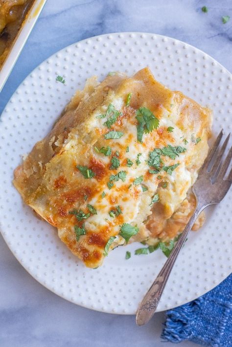 Do you love fresh green chile? If so, you're going to love these Cheesy Green Chile and Potato Enchiladas! These vegetarian enchiladas are the perfect meal to warm you up this winter. They're made with both chopped green chile as well as green chile enchilada sauce. The potatoes are seasoned perfectly and add so much flavor to this easy weeknight dinner! #vegetarianenchiladas #greenchile #cheeseenchiladas #dinnerrecipe #familydinner Vegetarian Enchiladas Recipe, Potato Enchiladas, Green Chile Enchilada Sauce, Green Chile Enchiladas, Vegetarian Enchiladas, Black Bean Enchiladas, Seasoned Potatoes, Bean Enchiladas, Cheese Enchiladas