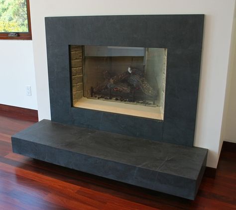 Home & Hearth | Fireplace Surrounds Slate Fireplace Surround, Granite Fireplace, Slate Fireplace, Honed Granite, Cleaning Painted Walls, Glass Cooktop, Deep Cleaning Tips, Fireplace Hearth, Clean Slate