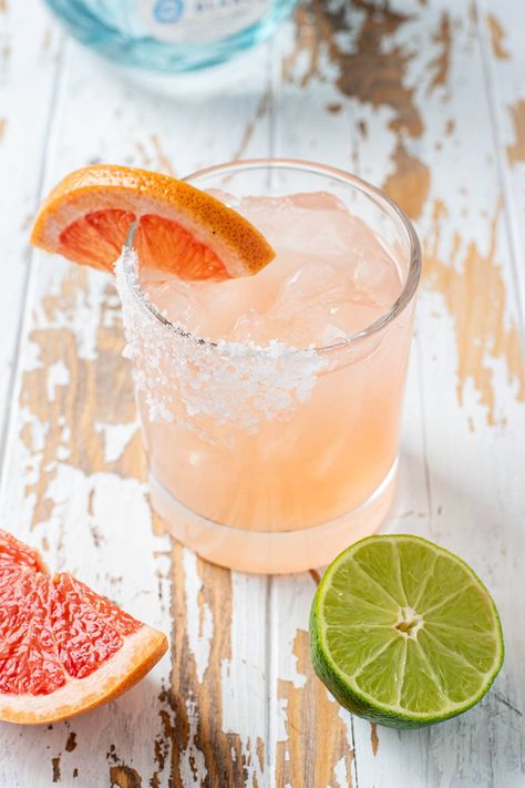 My grapefruit margaritas are made with blanco tequila, freshly squeezed grapefruit juice, fresh lime juice, simple syrup, and elderflower liquor. They’re real, simple, and offer a refreshing twist on the classic marg. A lot of critics may think a grapefruit-based cocktail is bitter. Well, you're right, however, paired with simple syrup and elderflower, that bitterness fades into the irresistible flavor. #grapefruitmargarita #margaritarecipe #cocktail #grapefruitcocktail Grapefruit Tequila Cocktail, Pink Grapefruit Margarita, Grapefruit Cocktail Vodka, Kitchen Swagger, Grapefruit Margarita Recipe, Elderflower Liquor, Sparkling Grapefruit Cocktail, Grapefruit Juice Cocktail, Brunch Cocktail Recipes