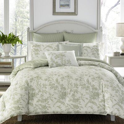 The Natalie duvet cover bonus set from Laura Ashley features a serene sage green color palette that brings lovely tranquillity to your bedroom decor. The classic green floral toile design is printed on a stylish ivory cotton ground, while a crisp shirting stripe pattern is featured on the duvet reverse. The shirting stripe is repeated on the European shams and square decorative pillow, making this timeless classic fit easily into any modern bedroom. A floral embroidered accent pillow repeats the Laura Ashley Bedding, Queen Size Comforter Sets, Queen Size Comforter, Twin Comforter Sets, Green Duvet, Green Duvet Covers, King Duvet Cover Sets, King Comforter Sets, Reversible Duvet Covers