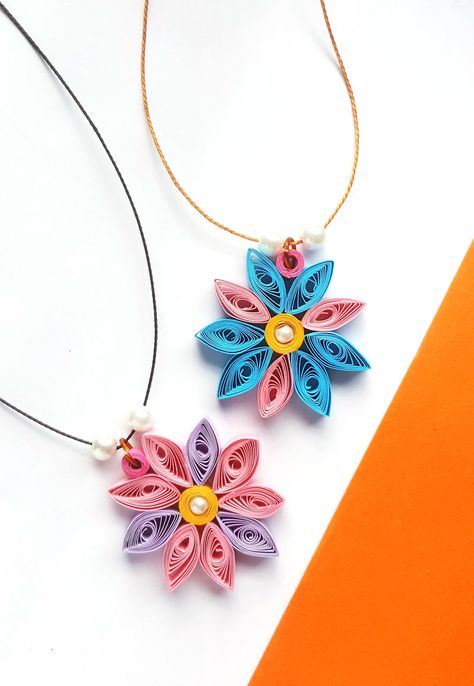 paper quilling flowers are an easy project for beginners and kids - and beautiful DIY jewelry to craft. Free Quilling Patterns, Paper Quilling For Beginners, Paper Quilling Flowers, Paper Quilling Jewelry, Diy Beading, Quilling Christmas, Quilled Paper Art, Quilled Jewellery, Quilling Jewelry