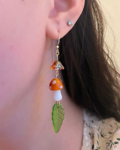 Cottagecore mushroom earrings��🍄🍄‍🟫🌸🍃 these dangle earrings are brand new to the shop!! I’ve been wearing mine daily since creating this design and I can’t get enough🙌🏼 shop link in bio to get yours 🔗 Elements Jewelry, Cottagecore Mushroom, Mushroom Jewelry, Mushroom Earrings, Ear Cuffs, May 13, Flower Earrings, Ear Cuff, Link In Bio