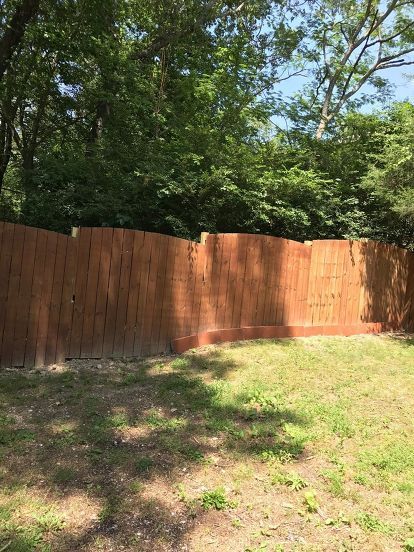 gaps at the bottom of wood privacy fence Gaps Under Fence Ideas, Fence Gap Filler Ideas, Landscape Stones, Fences Ideas, Home Depot Paint, Diy Privacy Fence, Wood Privacy Fence, Privacy Fence Designs, Landscape Stone