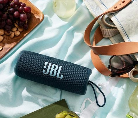 The JBL Flip 5 delivers powerful sound with its racetrack-shaped driver, offering deep bass in a compact size. It provides up to 12 hours of playtime, so you can enjoy your music longer without worrying about charging. With its IPX7 waterproof design, it's perfect for outdoor adventures—whether you're at the pool, beach, or caught in the rain. #speaker #JBL #gift Jbl Flip 6, Jbl Flip 5, Pool Beach, Bluetooth Speakers Portable, Race Track, Your Music, Outdoor Adventures, Outdoors Adventure, The Pool