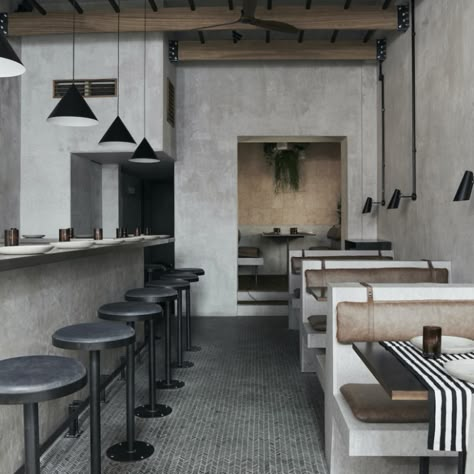 Cement Interior, Brutalist Interior, Coffee Shop Concept, Industrial Restaurant, Cement Walls, Counter Seating, Concept Ideas, Banquette Seating, Brutalist Architecture