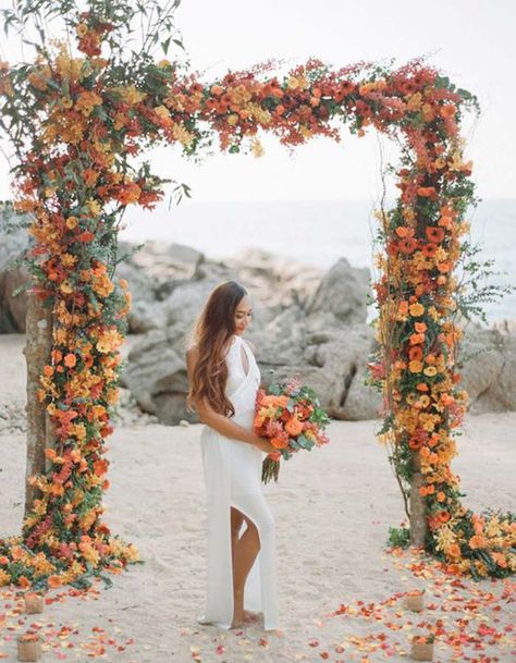 Transition seamlessly into the new season by placing this Fall-inspired arbor at your beach wedding! Beach Wedding Aisles, Beach Wedding Arch, Fall Wedding Arches, Orange Wedding Colors, Beach Wedding Decorations Reception, Tropical Wedding Inspiration, How To Dress For A Wedding, Wedding Orange, Fall Beach