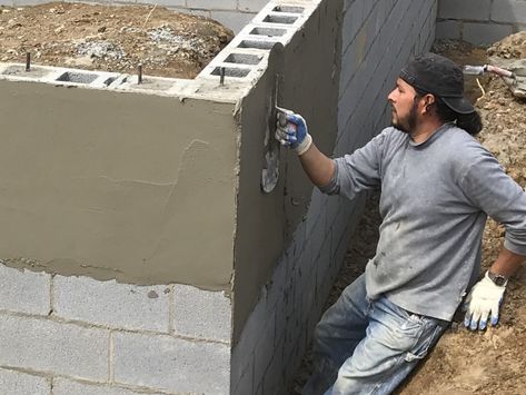 Block and Stucco – Project Small House Diy Stucco Exterior, Concrete Block Retaining Wall, Cinder Block House, Block Retaining Wall, Concrete Block House, Concrete Block Foundation, Foundation Ideas, Block Foundation, Backyard Wall