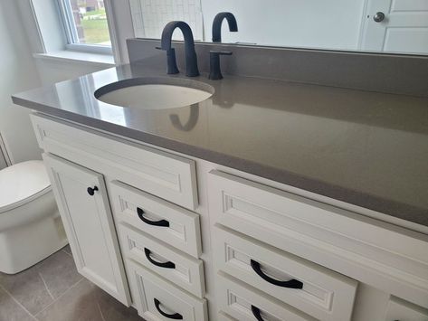 White Vanity Grey Countertop, Black Bathroom Fixtures Gray Cabinets, Gray Quartz Bathroom Countertops, Gray Marble Bathroom Countertop, Dark Gray Bathroom Countertop, Grey Expo Quartz Countertops, Gray Countertops Bathroom, Bathroom Grey Countertop, Grey Countertops Bathroom