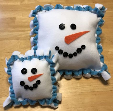 No-Sew Snowman Pillow | Fun Family Crafts Fleece Sewing Projects, Baby Jesus Ornament, Tie Pillows, Fleece Crafts, Fleece Projects, Pillows Ideas, Fleece Pillow, Snowman Pillow, Winter Pillows