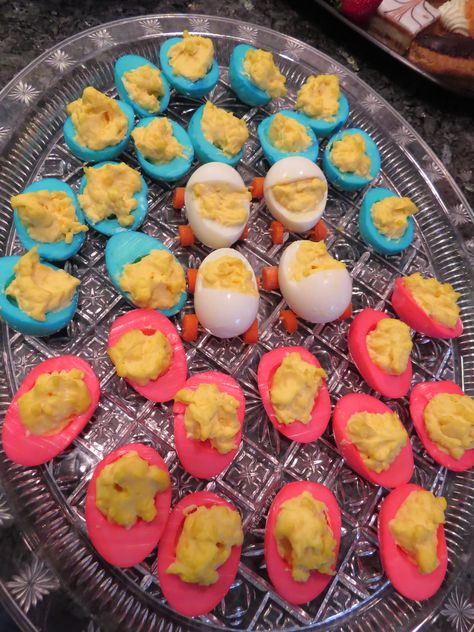 Pink and blue deviled eggs.  White egg carriages in the middle with carrot wheels. Deciled Eggs, Blue Deviled Eggs, White Egg, Deviled Egg, Reveal Party, Deviled Eggs, Reveal Parties, Gender Reveal Party, Gender Reveal