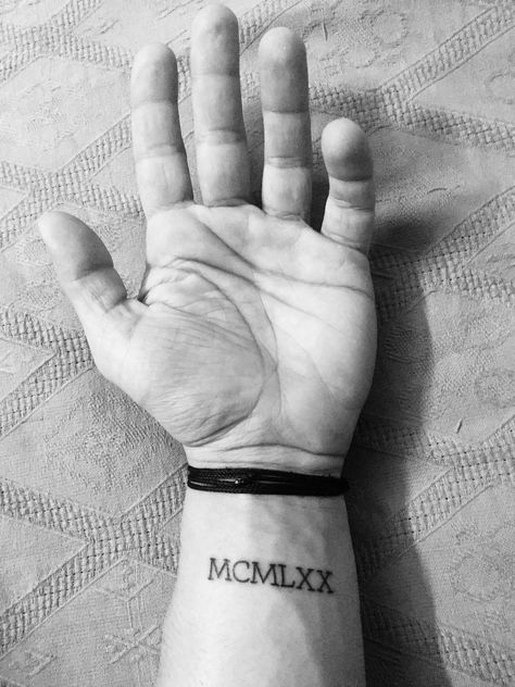 #tattoo #wrist #ideas #numerals #mcmlxx #1970 #smalltattoo Tattoo With Roman Numerals, Tattoo Wrist Ideas, Roman Numeral Font, Under Breast Tattoo, Tattoo Wrist, Name Tattoos, Tank Girl, Piercing Tattoo, Tattoo Fonts