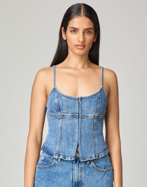 The most flattering denim corset top, this little number features a hook and eye closure and a scoop neckline. Denim Corset Top, Blue Crush, Denim Corset, Hook And Eye, A Hook, Corset Top, Scoop Neckline