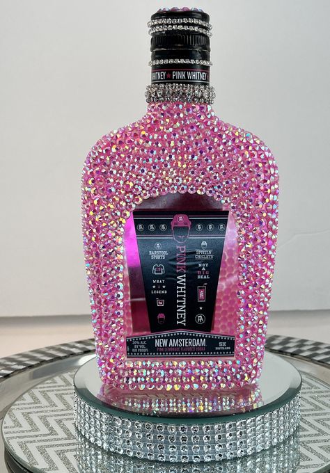 Bling Glam AB Rhinestones Pink W H I T N E Y Vodka Bottle Decanter Home Decor Bar Decanter Party Anniversary  Done is Hot Pink Rhinestones with Chain embellishments!  Hand Designed one rhinestone at a time by me to create a Glam like no other!  Listing is for 375ml size.  This Beautiful Hand designed Glass Decanter Bottle comes empty and its up to you to fill it up! Would make a great gift or display it on your bar for the major Bling effect. Check out my other Bling items! Thank you! Bar Cart Party, Bejeweled Bottles, Bling Items, Alcohol Bottle Decorations, Vodka Decanter, Bedazzled Liquor Bottles, Hennessy Bottle, Bedazzled Bottle, Alcohol Bottle Crafts