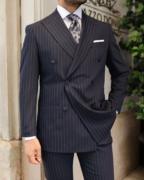 Honest Street ✨ A double-breasted suit with peak lapels is a timeless classic, and this steel blue pinstripe version is no exception. The tailored slim fit creates a sharp, modern silhouette that is sure to impress in any formal setting. The steel blue colour of the suit is a refreshing change from the more traditional navy or black options, while the subtle pinstripe adds a touch of sophistication. The double-breasted design with peak lapels provides an air of authority and formality, maki... Navy Pinstripe Double Breasted Suit, Pinstripe Double Breasted Suit Men, Double Breasted Suit Men Classy, Navy Blue Pinstripe Suit, Pin Stripe Suit, Men's Tuxedo Wedding, Law Practice, Double Breasted Suit Men, Blue Pinstripe Suit