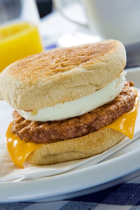 McDonald's has released their secret recipe for the Sausage and Egg McMuffin. Enjoy this classic breakfast sandwich at home. Here's the official recipe. Egg Mcmuffin Recipe, Sausage And Egg Mcmuffin, High Protein Muffins, Hot Sandwich Recipes, Savory Muffins Recipes, Egg Mcmuffin, Breakfast Muffin, Freezer Breakfast Sandwiches, Cheese Breakfast