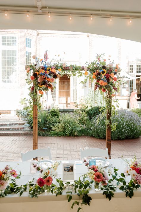 Wildflower Ceremony Decor, Sweetheart Table With Bud Vases, Sweetheart Table Wedding Wildflower, Simple Wildflower Wedding Arch, Wedding Ceremony Flower Arch, Wildflower Head Table, Wild Flower Ceremony, Sweetheart Table Wildflowers, Sweetheart Table Bud Vases