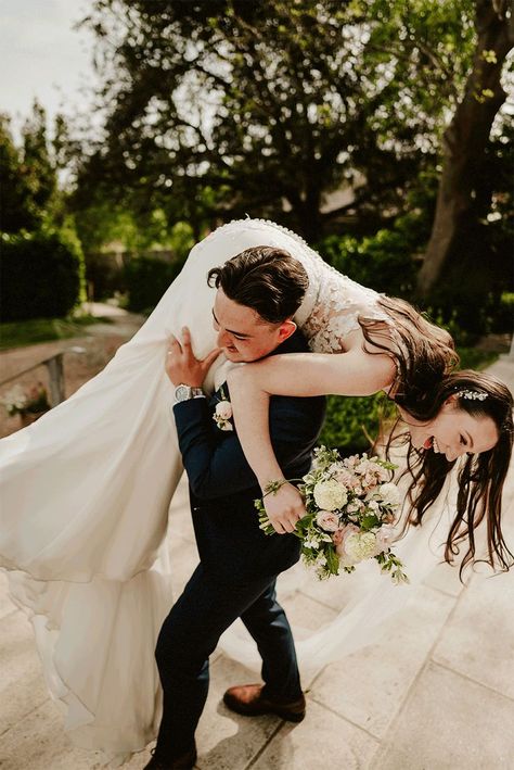 gif of bride being carried whilst laughing on wedding day Bridal Style Carry Couples Aesthetic, Bridal Style Carry Couples, Bridal Style Carry, Wedding Photos Movie Style, Bridal Carry, Groom Carrying Bride, Groom Carrying Bride Over Shoulder, Wedding Photos Documentary, Bride And Groom Looking At Camera