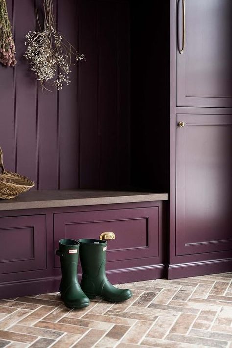 Purple mudroom with brick herringbone pavers features purple cabinets with brass pulls and a purple bench with purple stone top. Brick Herringbone Floor, Whittney Parkinson Design, Whittney Parkinson, Herringbone Brick Floor, Purple Cabinets, Transitional Laundry Room, Victorian Boots, Purple Kitchen, Tudor Style Homes