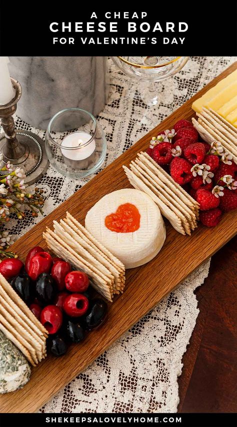 This easy, inexpensive Valentine’s Day cheese board has just 3 cheeses, crackers, olives, berries, a little strawberry preservers and a few tiny flowers. It can be assembled in just 5 minutes, but looks so thoughtful and romantic! All you need is a cheese board, cheese knife and a little heart-shaped cookie cutter to create this memorable Valentine’s or Galentine’s Day treat. Fancy Cheese Board, Valentines Day Recipes, Cheesecake Mousse Recipe, Cheese Ideas, Valentines Party Food, Party Food Bar, New Year's Eve Appetizers, Cheese Brands, Bacon Deviled Eggs