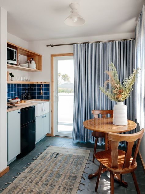 See Daunt's Albatross Montauk Makeover In This Before and After Simple Bed Frame, Home Studios, Blue Backsplash, Blue Kitchen Cabinets, 70s Decor, Colored Ceiling, Simple Bed, Tiny Spaces, Green Tile