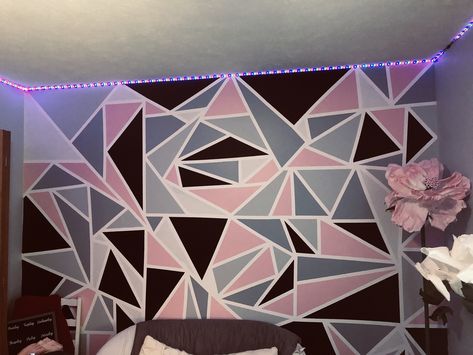 My daughter’s accent wall in her bedroom Accent Wall Bedroom Paint Pattern, Geometric Wall Pattern, Triangle Wall Design, Geometric Accent Wall Bedroom, Wall Painting On Purple Wall, Wall Design Purple, Purple Wall Design Paint, Triangle Wall Paint, Wall Paint Patterns Purple